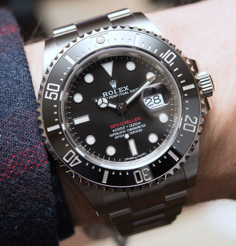 Sea Dweller Men's Watch Black Background 126600-0001