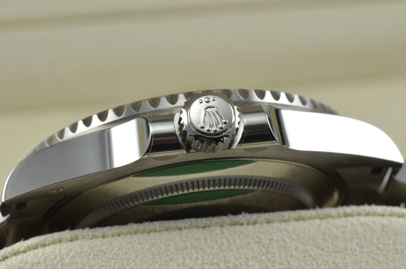 Luxury Watch Submariner Blue Bezel Black Background